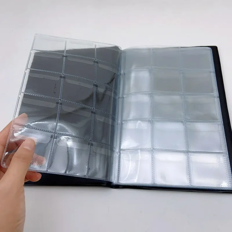 Album ruudustiku ja klapiga müntide kindlaks kinnitamiseks